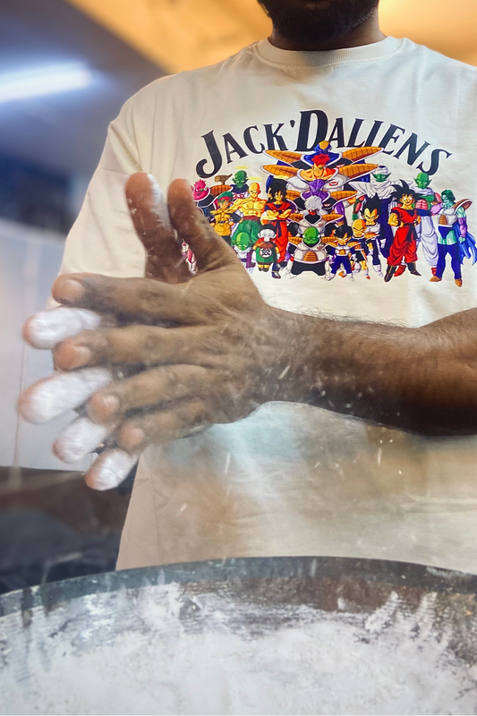 Midphysiq oversized Jacked Aliens Dragon Ball Z Anime tshirt, front print, rubbing Chalk in the gym.